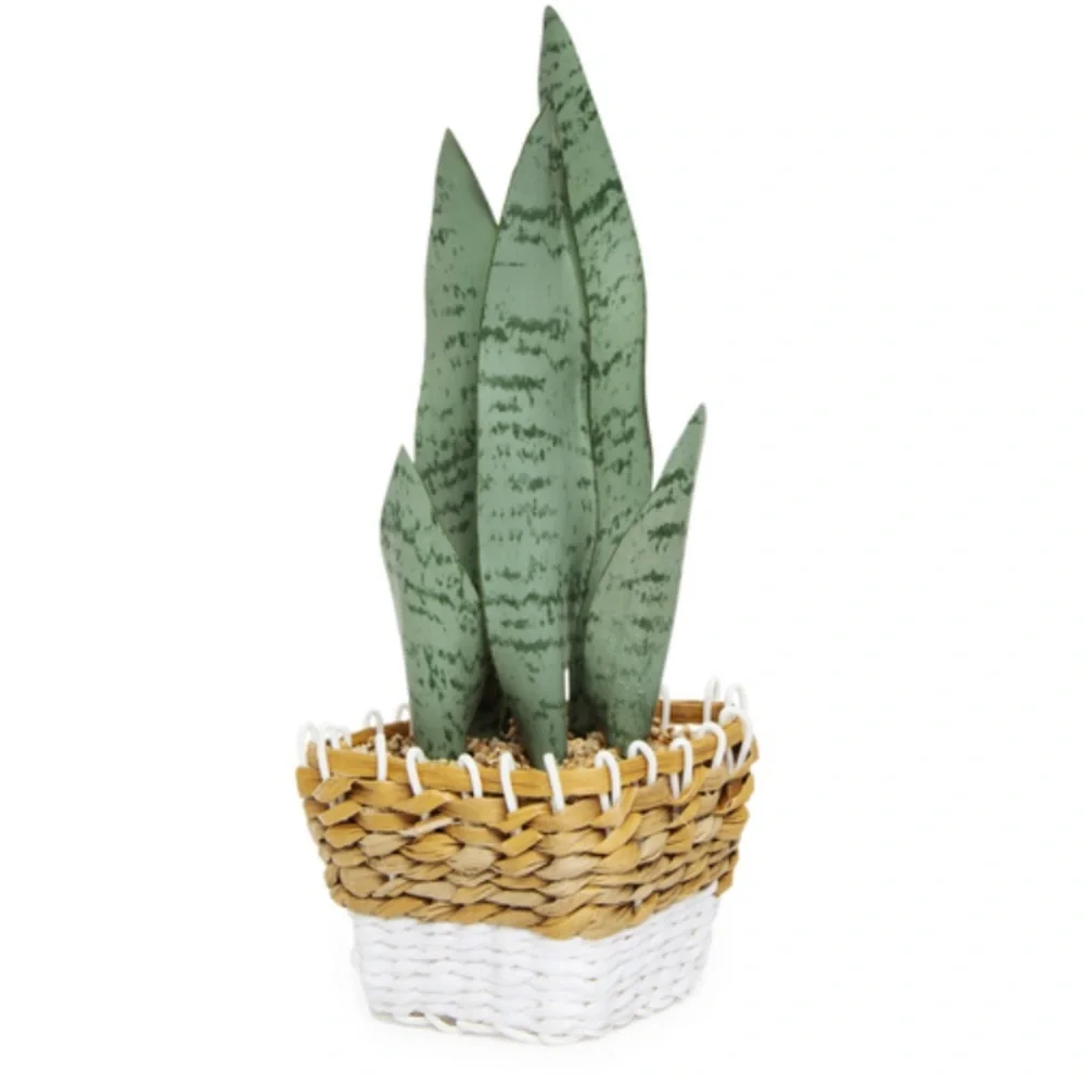 Faux snake plant with woven basket planter